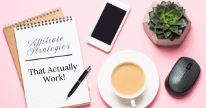 Laptop, coffee, and notebook with Affiliate Strategy written, representing online business planning